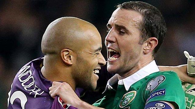 Darren Randolph celebrates victory over Germany with John O'Shea