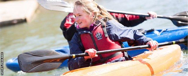 girl canoeing