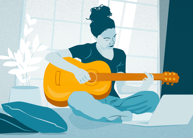 Woman playing guitar