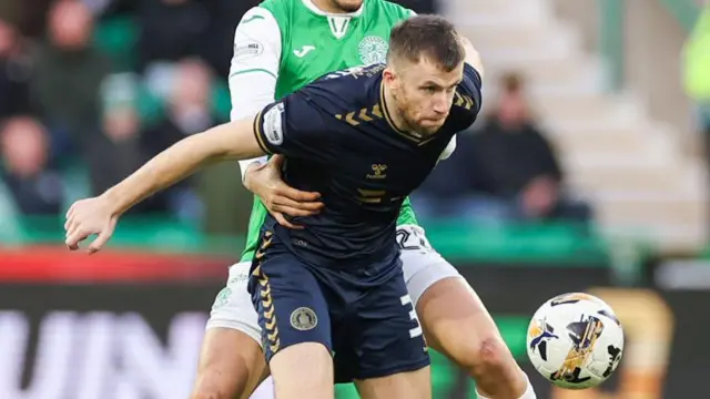 EDINBURGH, SCOTLAND - DECEMBER 29: Hibernian's Nectar Triantis and Kilmarnock's Liam Polworth in action during a William Hill Premiership match between Hibernian and Kilmarnock at Easter Road, on December 29, 2024, in Edinburgh, Scotland. (Photo by Roddy Scott / SNS Group)