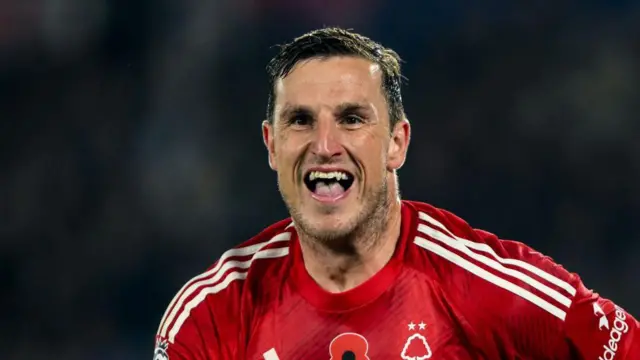 Chris Wood of Nottingham Forest celebrates after scoring a goal to make it 1-3 during the Premier League match between Leicester City and Nottingham Forest at the King Power Stadium