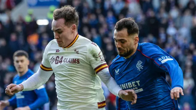 Motherwell's Kofi Balmer and Rangers' Nedim Bajrami