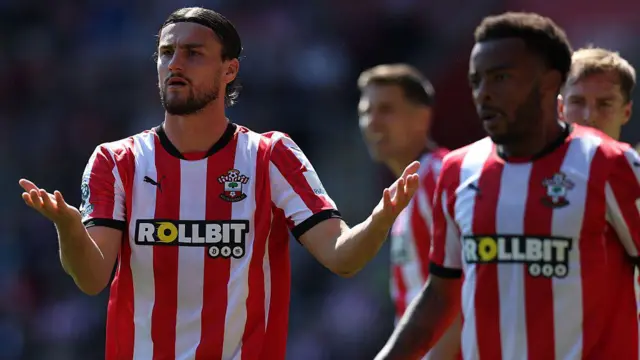 Southampton players displeased with a decision. 