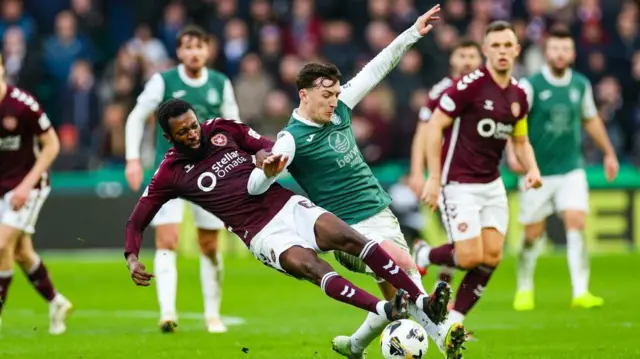 Hibernian's Josh Campbell (right) and Hearts' Beni Baningime 