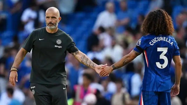 Enzo Maresca high fives Marc Cucurella 