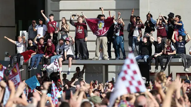  A general view as fans line the streets to greet the Aston Villa team bus