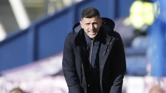 John Mousinho on the touchline at Deepdale