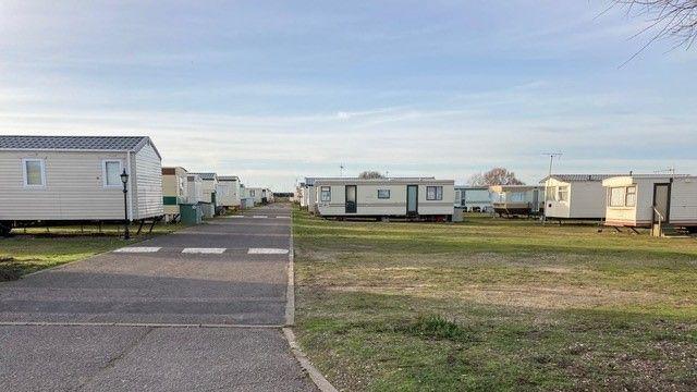 A collection of caravans at a caravan park
