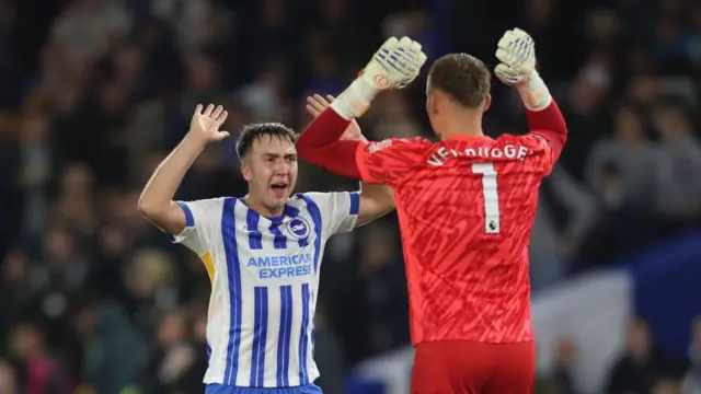 Brighton's Jack Hinshelwood and Bart Verbruggen celebrate at the final whistle