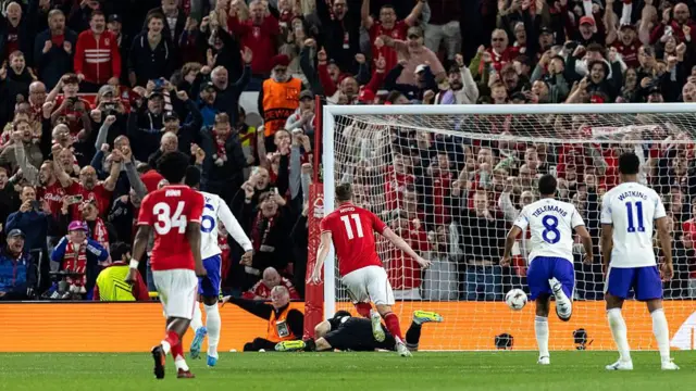 Chris Wood scores a penalty for Forest against Villa