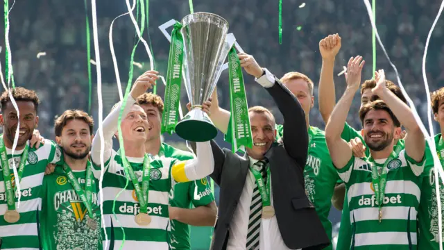 Celtic's Callum McGregor and manager Brendan Rodgers lift the trophy during a William Hill Premiership match between Celtic and St Mirren at Celtic Park