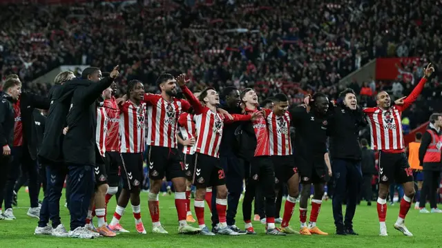 Sunderland players celebrate at full time 