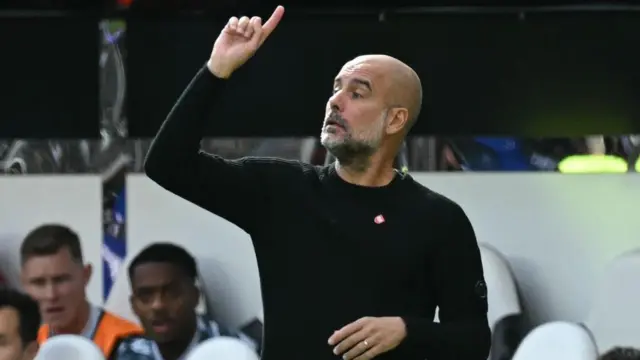 Manchester City's Spanish manager Pep Guardiola gestures on the touchline during the English Premier League football match between Newcastle United and Manchester City at St James' Park