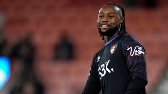 Antoine Semenyo warms up before a Bournemouth match
