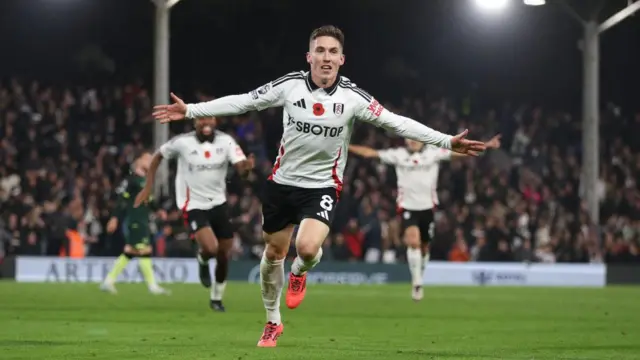 Fulham's Harry Wilson celebrates scoring his side's second goal during the Premier League match between Fulham FC and Brentford FC at Craven Cottage