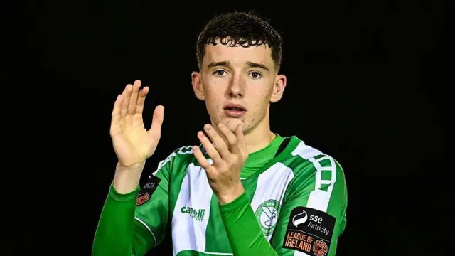 Rhys Knight, clapping his hands, while on the pitch for Bray Wanderers