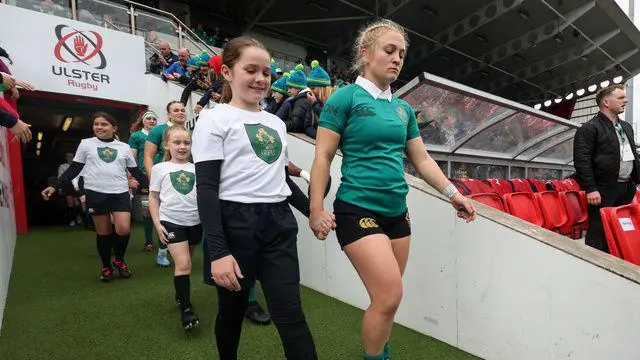 Neve Jones with a mascot at Kingspan Stadium