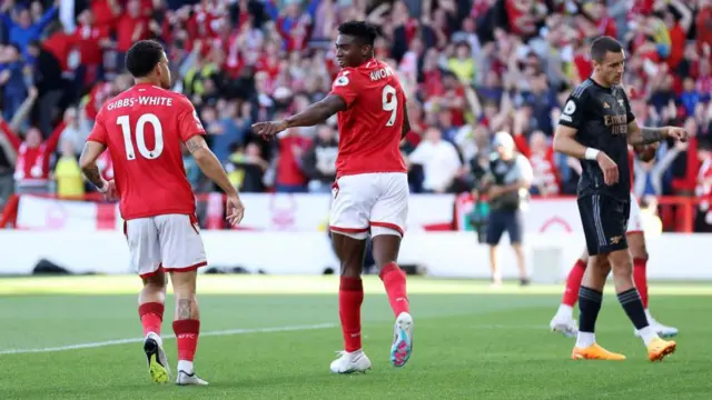 Taiwo Awoniyi celebrates scoring the winner against Arsenal in 2023.