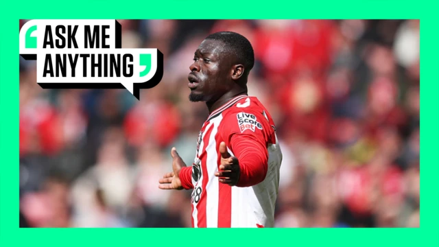 Brian Brobbey holds his arms outstretched on a green border with 'Ask me Anything' branding