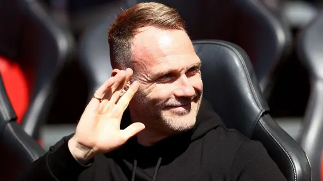 Southampton manager Simon Rusk on the bench