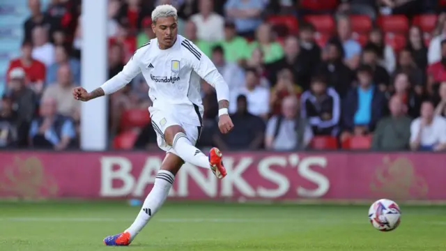 Morgan Rogers scores Aston Villa's first goal against Walsall