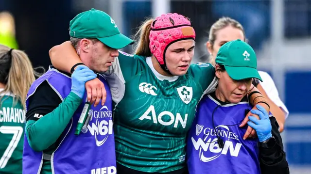 Dorothy Wall hobbles off during Ireland's loss to Scotland