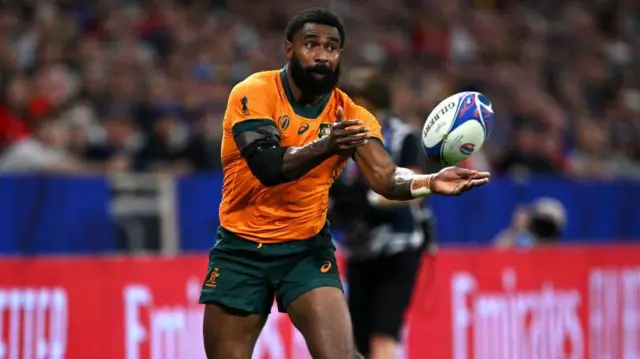 Marika Koroibete passing the ball