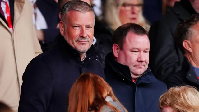 Mark Clattenburg in the stand at a Nottingham Forest match