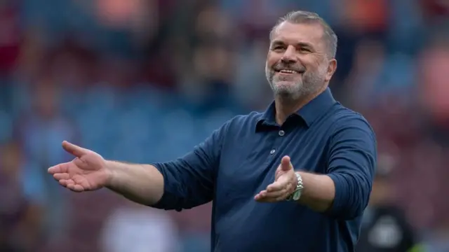 Ange Postecoglou celebrates with the Spurs fans
