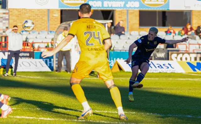 Luke McCowan scoring against Livingston