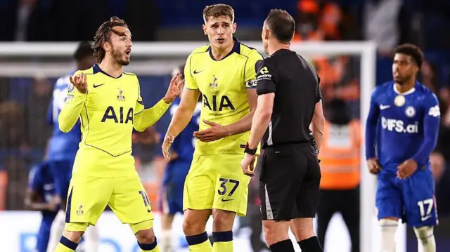 Micky van de Ven and James Maddison remonstrate with the referee
