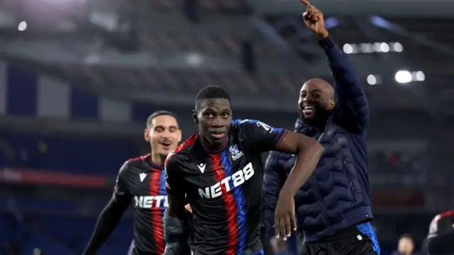 Ismaila Sarr of Crystal Palace celebrates after the team's victory during the Premier League match between Brighton & Hove Albion FC and Crystal Palace FC at Amex Stadium