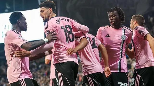 Leicester players celebrate a goal this season