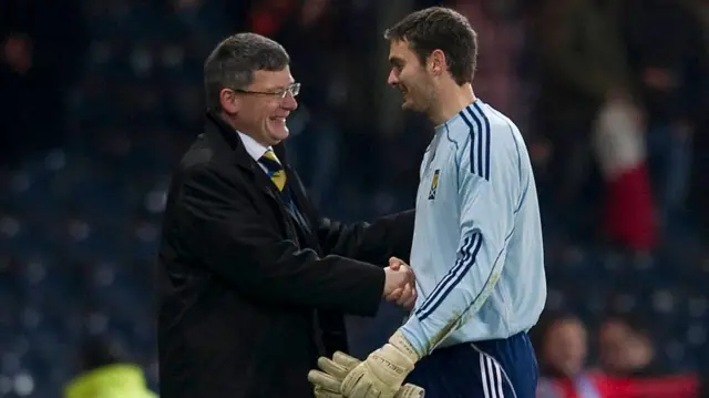 Craig Levein congratulates Craig Gordon at full time after keeping a clean sheet for Scotland in 2010