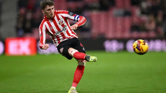 Sunderland captain Dan Neil kicking the ball