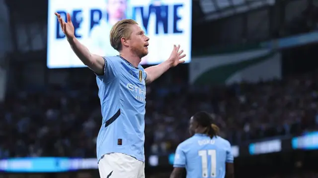 Kevin De Bruyne celebrating after scoring against Wolves. 