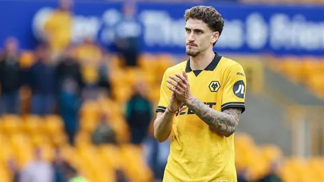 Santiago Bueno claps Wolves fans after a match