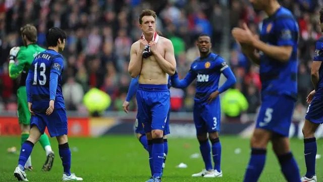 Phil Jones of Manchester United looks dejected at full-time at the Stadium of Light in 2012.