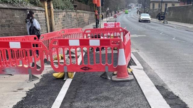 Roadworks under way on a busy Leeds road