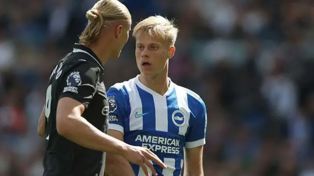 Erling Haaland of Manchester City argues with Jan Paul van Hecke of Brighton 