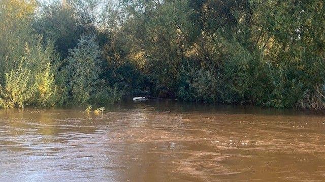 A muddy River Wye running through Hereford