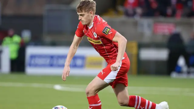 Ben Wylie in action for Cliftonville