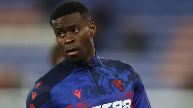 Marc Guehi looks on for Crystal Palace during warm up