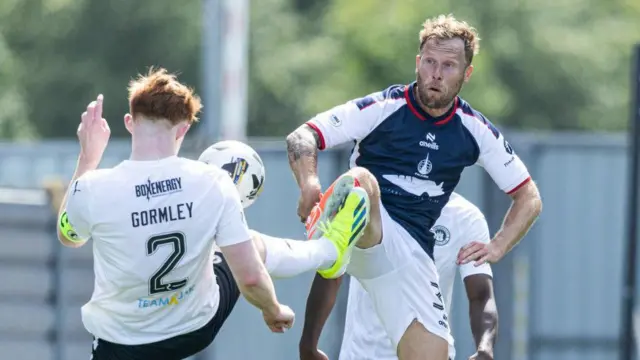 Scott Arfield challenges an Edinburgh City player