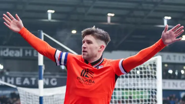 Josh Windass celebrates a goal for Sheffield Wednesday