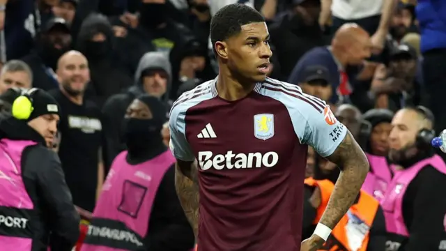 Marcus Rashford looks on during match
