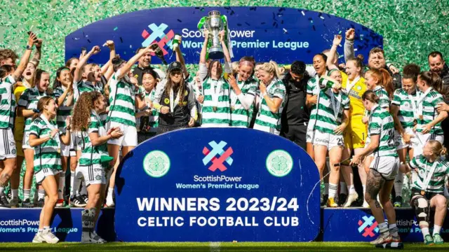 Celtic Captain Kelly Clark lifts the SWPL trophy at Celtic Park