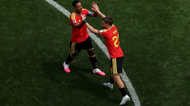 Belgium players Youri Tielemans and Nicolas Raskin celebrating