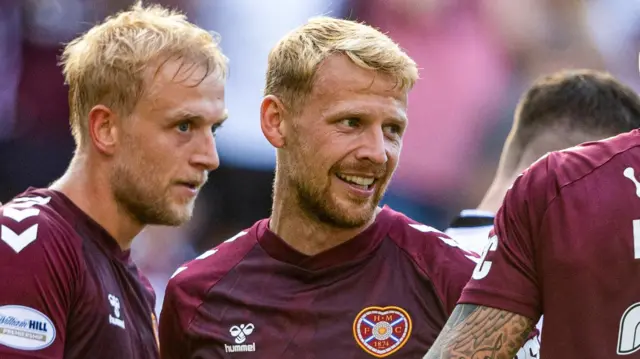 Heart of Midlothian's Stephen Kingsley (centre) celebrates with his team mates after scoring to make it 4-1 during a Premier Sports Cup group stage match between Heart of Midlothian and Dunfermline at Tynecastle Park