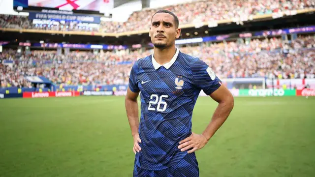 Maxence Lacroix of France with his hands on his hips during the game against England at the World Cup
